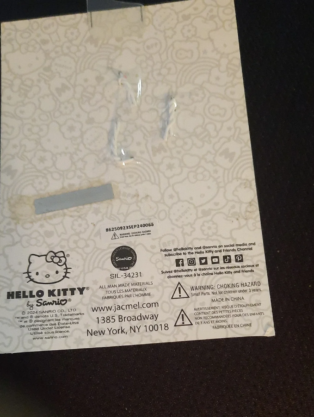Hello Kitty Silver Crystal Face Keychain with Red Bow